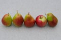 Pears and apple on the table Royalty Free Stock Photo