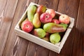 Pears and apples in wooden box Royalty Free Stock Photo