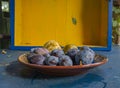 Pears and blue plums in a yellow Drawer