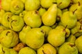 Pears in a box on the market. Royalty Free Stock Photo