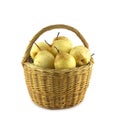 Pears in brown wicker basket isolated Royalty Free Stock Photo