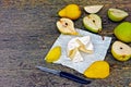 Pears and camembert cheese on a wooden surface. Royalty Free Stock Photo