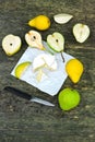 Pears and camembert cheese on a wooden surface. Royalty Free Stock Photo