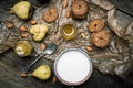 Pears Cookies and sour cream on wooden table