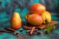 Pears on a dark background. Fresh, ripe fruits on a blue plate and in a box. Healthy eating