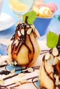 Pears with flaked almonds and chocolate sauce Royalty Free Stock Photo