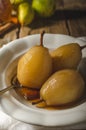 Pears glazed in tea and cinnamon Royalty Free Stock Photo