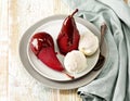 Pears poached in red wine