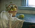 Pears are in a small basket