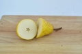 Pears, two pieces of cut half pear Royalty Free Stock Photo