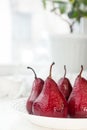 Pears in wine. Traditional dessert pears stewed in red wine with