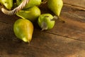Pears on a wooden background. Fruit harvest. Autumn still life. Pear variety Bera Conference Royalty Free Stock Photo