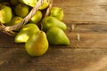 Pears on a wooden background. Fruit harvest. Autumn still life. Pear variety Bera Conference Royalty Free Stock Photo