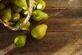 Pears on a wooden background. Fruit harvest. Autumn still life. Pear variety Bera Conference Royalty Free Stock Photo