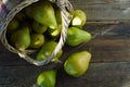 Pears on a wooden background. Fruit harvest. Autumn still life. Pear variety Bera Conference Royalty Free Stock Photo