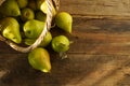 Pears on a wooden background. Fruit harvest. Autumn still life. Pear variety Bera Conference Royalty Free Stock Photo