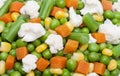 Peas, green beans, carrots and cauliflower.