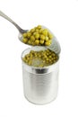 peas in metal spoon