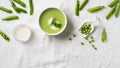 Peas soup in bowl with pea bods and cream