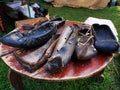 Peasant sandals of leather on the table