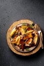 Peasant-style potatoes with wild mushrooms morels seasoned with chili and greens