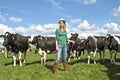 Peasant woman and her cows Royalty Free Stock Photo