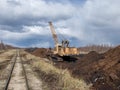 Peat mining bog, Peat mining machinery Royalty Free Stock Photo