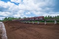 peat transport wagons at the loading point. Raised platform for loading and unloading peat