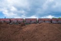 peat transport wagons at the loading point. Raised platform for loading and unloading peat