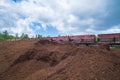 peat transport wagons at the loading point. Raised platform for loading and unloading peat