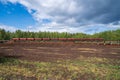 peat transport wagons at the loading point. Raised platform for loading and unloading peat