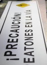 Peatonal precaution road sign in spanish Royalty Free Stock Photo