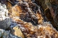 Peaty water streaming down in County Donegal - Ireland Royalty Free Stock Photo