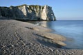 Pebble beach and cliff of Etretat in France