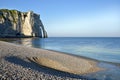 Pebble beach and cliff of Etretat in France