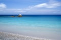 Pebble beach on a Greek island Royalty Free Stock Photo