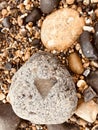 A pebble on a beach with a Love heart Royalty Free Stock Photo