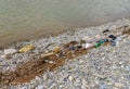 Pebble beach pollution Royalty Free Stock Photo