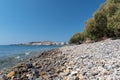 Pebble beach with turquoise lagoon near Paleochora town on Crete island, Greece Royalty Free Stock Photo