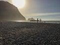 Pebble beach under the cliff. Gairua, Asturias, Spain