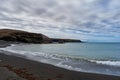 Pebble and black sand beach in Ajuy, Fuerteventura, Spain Royalty Free Stock Photo