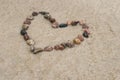 Pebble Heart Shape On Sand