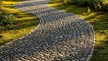 Pebble lined path winds through a garden surrounded by lush green Royalty Free Stock Photo