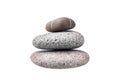 Pebble pile on white background isolated close up, stack of balanced zen stones, smooth sea pebbles pyramid, cobblestones tower Royalty Free Stock Photo