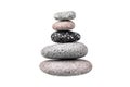 Pebble pile on white background isolated close up, stack of balanced zen stones, smooth sea pebbles pyramid, cobblestones tower Royalty Free Stock Photo