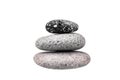 Pebble pile on white background isolated close up, stack of balanced zen stones, smooth sea pebbles pyramid, cobblestones tower Royalty Free Stock Photo