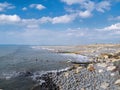 Pebble ridge beach scene at Westward Ho in north Devon, England. No people. Royalty Free Stock Photo