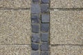 Pebble shingle cobblestone sidewalk background or texture. Royalty Free Stock Photo
