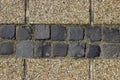 Pebble shingle cobblestone sidewalk background or texture. Royalty Free Stock Photo
