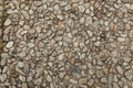 Pebble stone floor tile seamless background. Cement mixed gravel pebble stone floor texture. Royalty Free Stock Photo